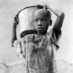Boy with a Bucket, Djenne, Mali