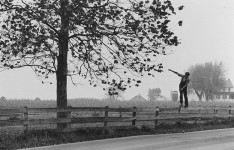 Amish Boy Walking on Fence, Lancaster, PA