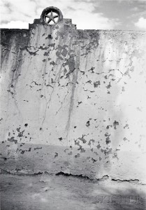 Sunlight on Weathered Wall with Star