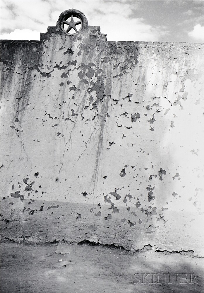 Sunlight on Weathered Wall with Star